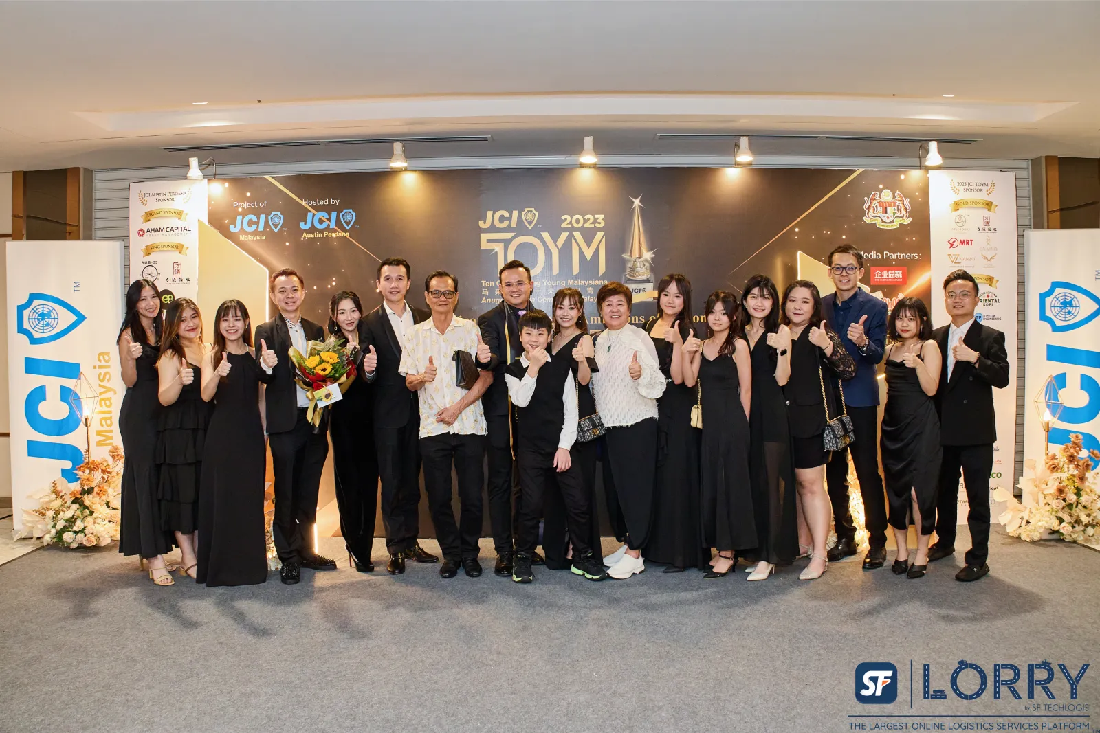 JCI TOYM 2023 finalists and participants at the official event backdrop.