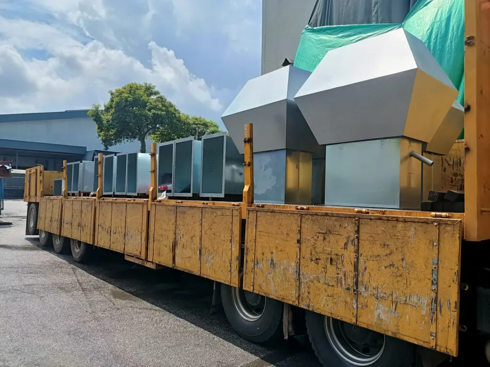 Open truck transporting large fabricated industrial metal cargo