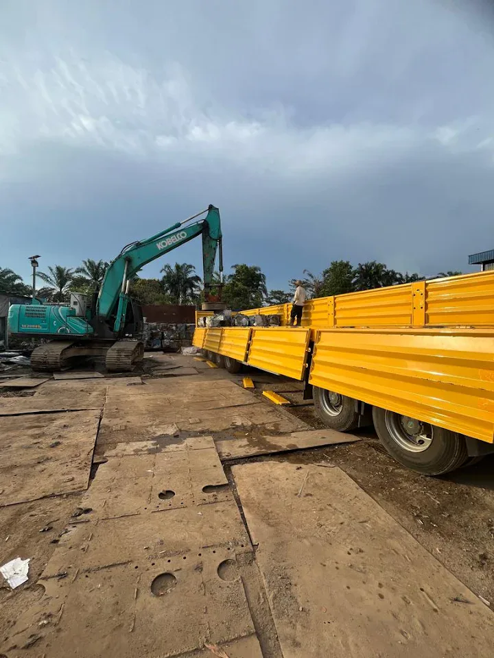 Industrial material loaded with excavator support